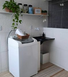 a washer and dryer in a small room