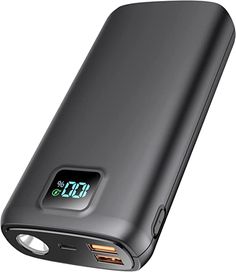 an external battery charger is shown with the clock displayed on it's side