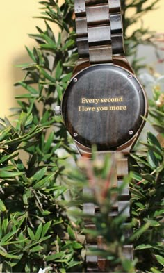 a wooden watch that says every second i love you more