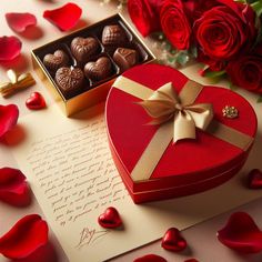 a heart shaped box filled with chocolates next to red roses and a letter that says i love you