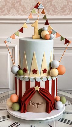 a circus themed birthday cake on a table