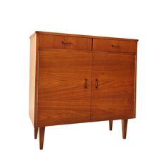 a wooden cabinet with two doors and three drawers