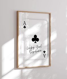 a playing card is hanging on the wall