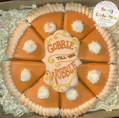 there is a cake in the box that says gobble til you wobble on it