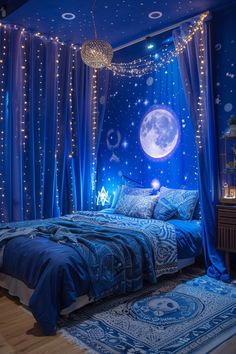 a bedroom decorated in blue with stars and moon lights