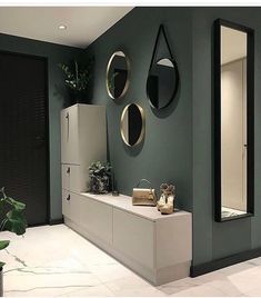 an instagram page with two mirrors on the wall