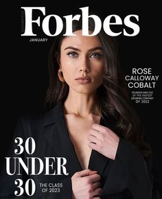 a magazine cover with a woman wearing a black suit