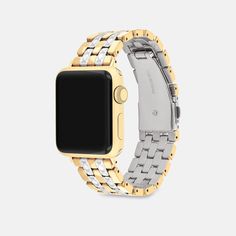 Made exclusively for use with the 38mm 40mm and 41mm Apple Watch® this two-tone stainless steel and gold tone link strap is subtly etched with our Signature. | Coach Apple Watch® Strap, 38 Mm, 40 Mm And 41 Mm - Women's - Two Tone Gold Stainless Steel Timeless Watch Bands, Modern Gold Stainless Steel Watch Band, Luxury Gold Metal Watch Bands, Luxury Metal Watch Accessories, Luxury Yellow Gold Stainless Steel Watch Accessories, Luxury Yellow Gold Stainless Steel Watches, Classic Gold Stainless Steel Apple Watch Band, Modern Gold Jewelry And Watches With Polished Finish, Modern Gold Apple Watch Band With Polished Finish