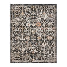 an area rug with black, beige and orange colors on the bottom half of it