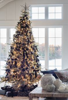 a decorated christmas tree in a living room