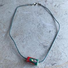 Glass/Ceramic Painted Cylinder Bead Pendant On A Blue Hemp Cord Choker Necklace, 14” Long. Message Me To Add An Extension Chain. Bead Is 90’s Vintage And It’s Painted Red/Orange, Green, Yellow And Pink. In Perfect Condition, Never Worn. Gold Heart Choker, Hemp Choker, Heart Necklace Tiffany, Long Message, Cord Choker, Heart Choker Necklace, Resin Pendant Necklace, J Crew Necklace, Heart Choker