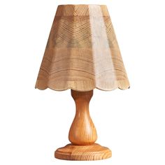 a wooden table lamp on a white background