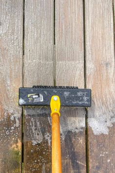 a hammer with the words how to make your own deck cleaner on top of it