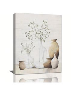 three vases with flowers in them sitting on a shelf