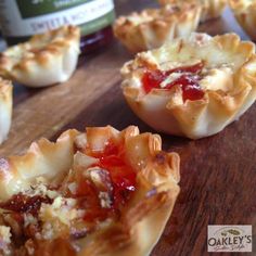 several small pies on a wooden table