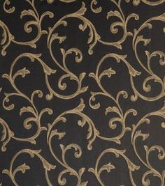 a black and gold wallpaper with swirls on the back in an ornate pattern