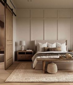 a bedroom with a large bed and wooden furniture