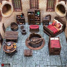 a living room filled with furniture next to a brick wall