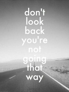 a black and white photo with the words don't look back you're not going that way