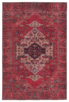 a red rug with an ornate design on the center and sides, in different colors