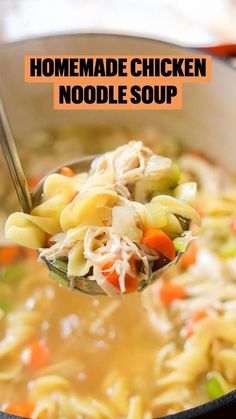 a ladle full of homemade chicken noodle soup is being held by a spoon