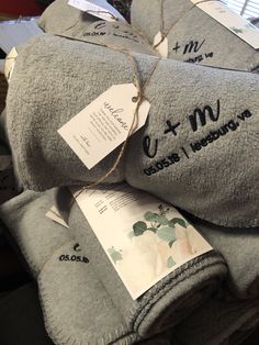 towels with tags on them are stacked up