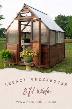 a small wooden house sitting on top of a lush green field