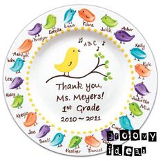 a personalized plate with colorful birds on it