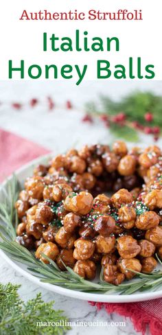 a white plate topped with honey balls on top of a red and green table cloth