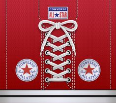 an image of a red shoe laces with converse all star stickers on it