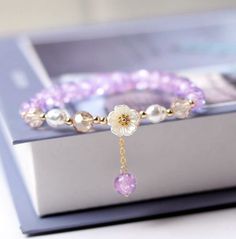 Fashion Crystal Beaded Daisy Flower Lucky Bracelet Elastic Bangle Women Gift Hot | eBay Purple Beaded Bracelets, Friendship Jewelry, Crystal Beads Bracelet, Elastic Bracelet, Purple Crystals, Flower Bracelet, Bangles Jewelry, Bracelet For Women, Flower Fashion