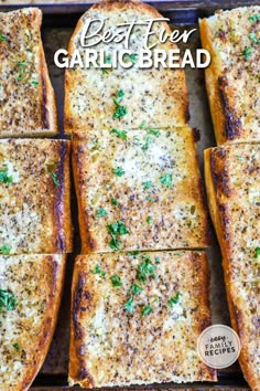 grilled garlic bread with parsley on top in a baking pan and text overlay that reads best ever garlic bread