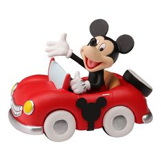 a mickey mouse driving a red toy car