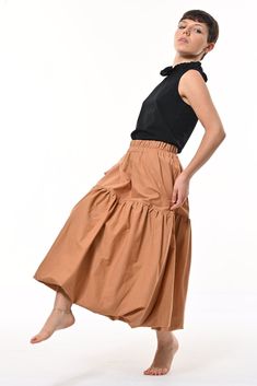 Tale: Make waves with this contemporary take on a 1850's puffball silhouette. shade is new for this season and looks great in this woven cotton. The biscuit Wear high in the waist or low as a hipster. The deep pockets are a great asset and the elasticated waist allows for expansion as well as comfort. Our model is 5ft 4" and wears an S with our Buttercup Top. Please see our size guide. 100% Cotton Skirt, 100% Polyester Lining Made in Britain 100% Cotton Skirt, 100% Polyester Lining Wash at 30* Warm Tumble Dry Warm Iron Do Not Bleach Do Not Dry Clean Animal Print Party, Knit Loungewear, Make Waves, Stocking Fillers For Her, Holiday Party Outfit, Cotton Skirt, Woven Cotton, Independent Designers Fashion, Bridal Collection