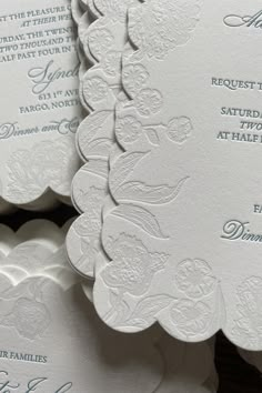 the wedding stationery is laid out on top of each other, and ready to be printed