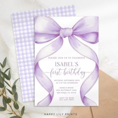 a card with a purple bow on it