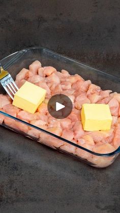 a glass casserole dish filled with meat and cheese