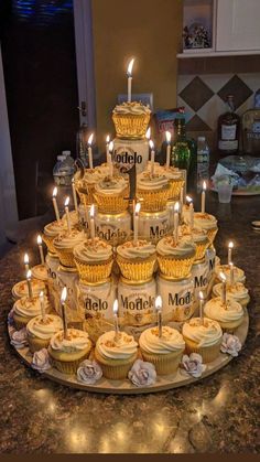 cupcakes are arranged in the shape of a pyramid