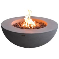 an outdoor fire pit is shown with flames