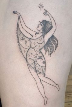 a woman with a tattoo on her thigh is holding a star above her head and dancing