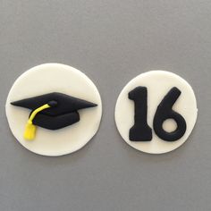 two decorated cookies with the number sixteen and graduation cap