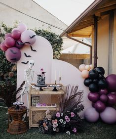 a halloween party with balloons and decorations