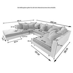 a sectional couch with pillows and measurements for it