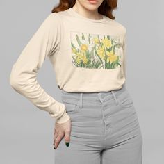 Our Designs Are Printed In-House On Sustainably Grown And Ethically Harvested Us Cotton. This Floral Shirt Features A Vintage Vtg Botanical Woodcut Art Illustration From Japan Of Blooming Daffodils (Narcissus). The Blossoms Are Depicted In Varying Shades Of Orange, White And Yellow With Traditional Handwritten Script Adjacent To The Border. They Are Spring Flowering Perennials, The March Birth Flower And Symbolize Regard For Someone. Condition: New, No Hang Tags Color: Natural Undyed Light Tan C Beige Long Sleeve T-shirt With Graphic Print, Beige Long Sleeve T-shirt For Spring, Casual Beige Screen Print Top, Spring Long Sleeve Graphic Tee, Yellow Long Sleeve T-shirt For Spring, Long Sleeve Graphic Tee For Spring, Spring Crew Neck Top With Screen Print, Spring Long Sleeve Screen Print Tops, Long Sleeve Screen Print Tops For Spring