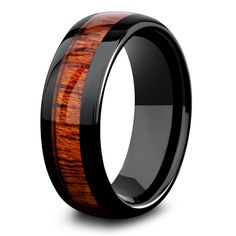 a black ceramic ring with a wooden inlay