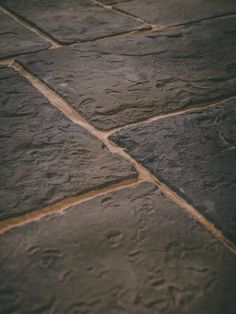 a close up view of a stone floor