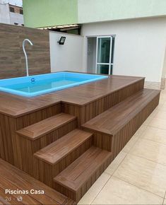 an above ground pool with steps leading up to it