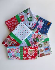 a pile of christmas fabric on top of each other