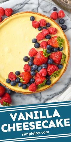 a cheesecake topped with berries and blueberries