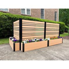 a wooden bench with flower boxes on it